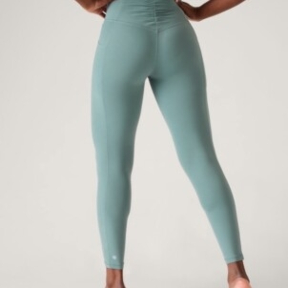 Athleta Salutation Stash Oxidezied Green Leggings